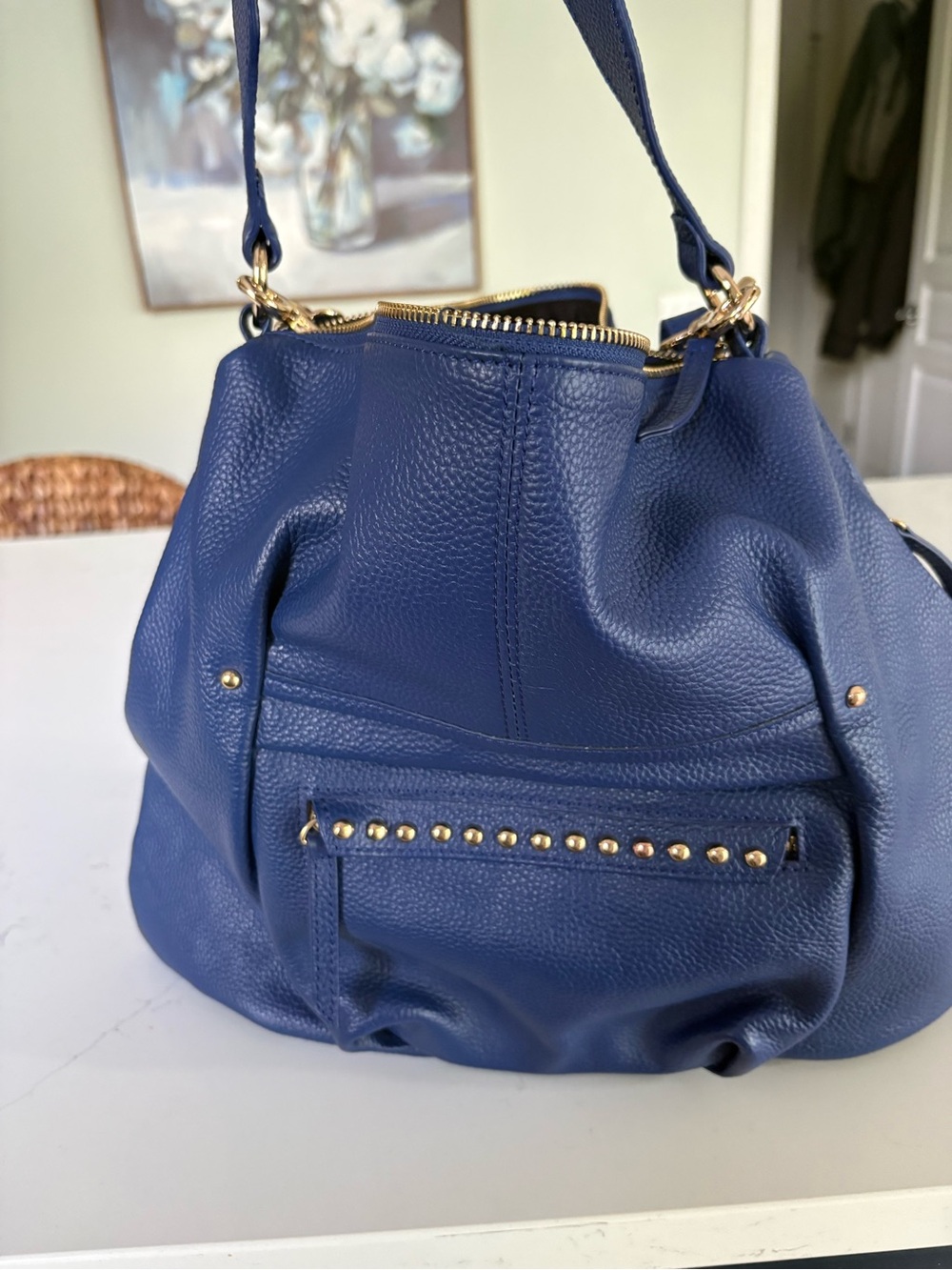 Laggo Blue Pebbled Leather Hobo with gold studded accents